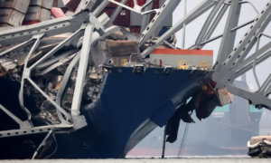 The Dali cargo ship is seen a day after crashing into the Francis Scott Key Bridge in Baltimore on Tuesday.